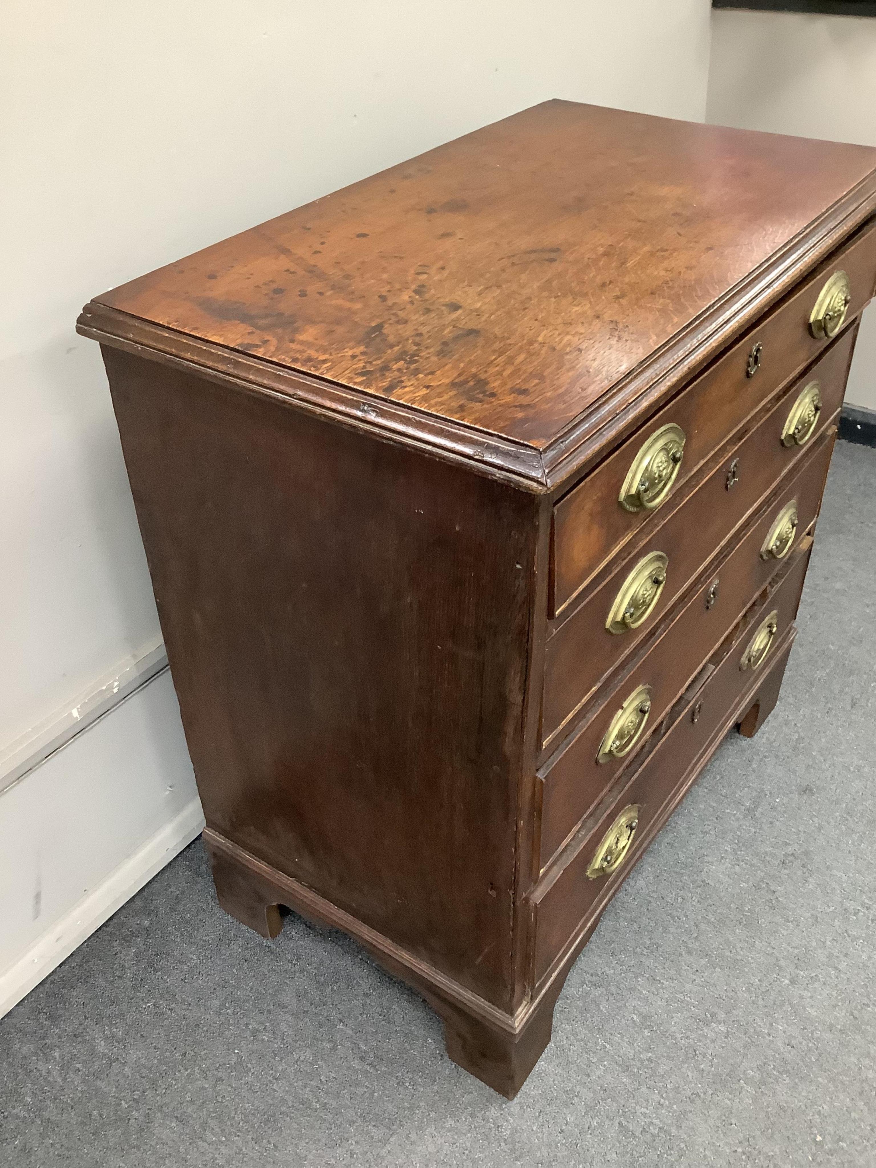 A small George III oak four drawer chest, width 80cm, depth 46cm, height 83cm. Condition - fair